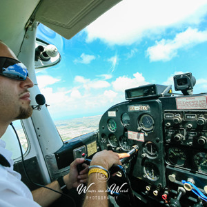 2008-07-29 - Onze piloot<br/>In het vliegtuigje onderweg teru - Isla Holbox - Mexico<br/>Canon EOS 30D - 10 mm - f/8.0, 1/200 sec, ISO 200